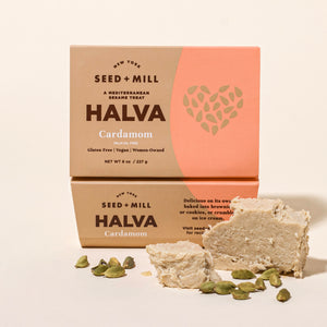 Seed + Mill Cardamom  halva packaging with halva blocks and cardamom seeds on a light background