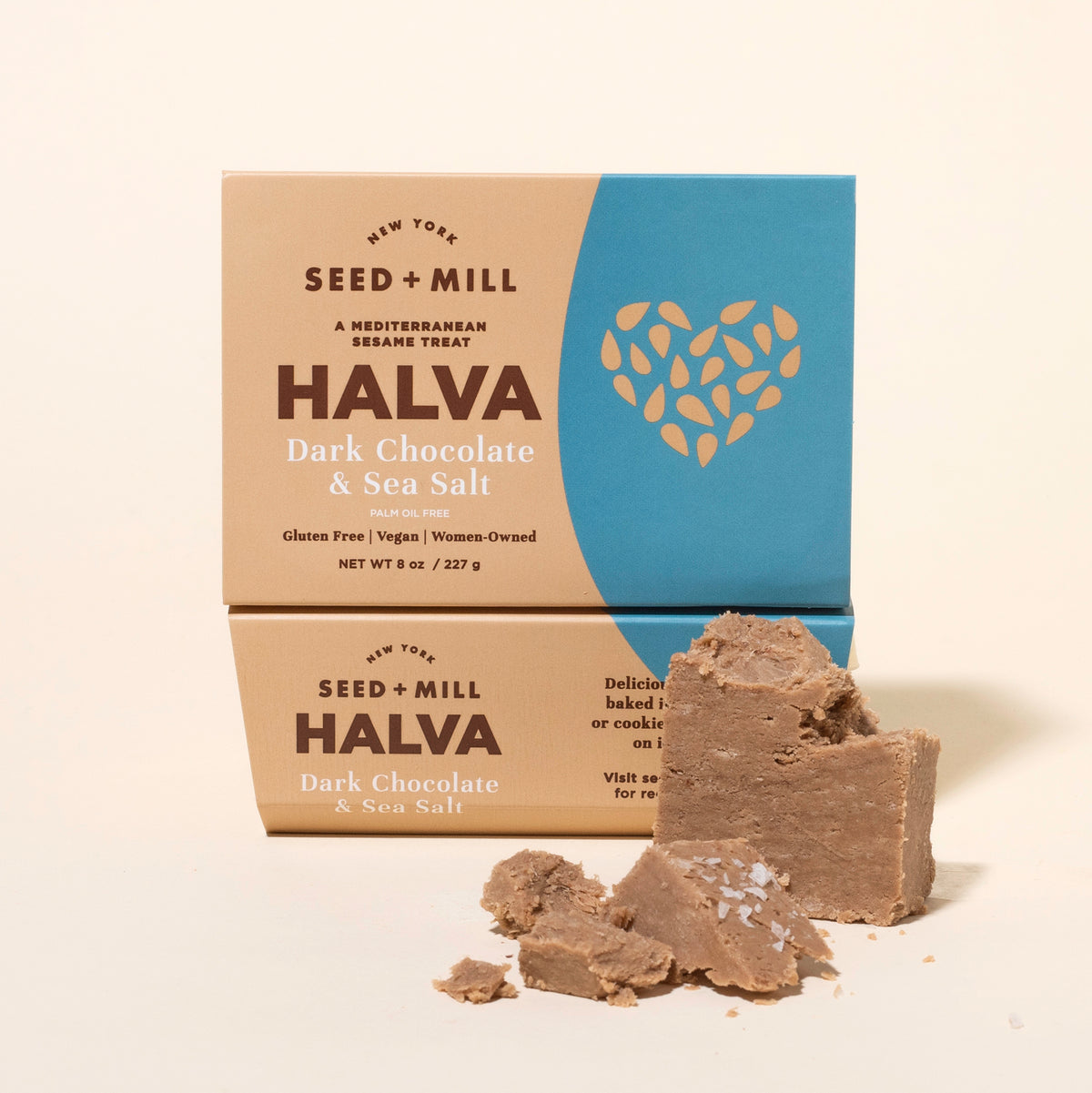 Box of Seed + Mill Halva Dark Chocolate & Sea Salt with halva in front on a beige background