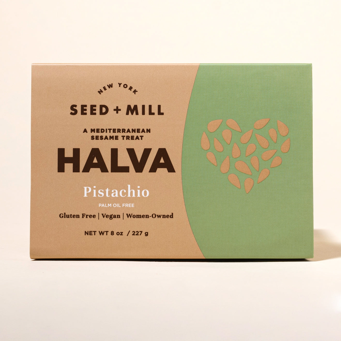 Box of Seed + Mill Pistachio Halva on a beige background