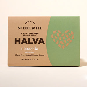 Box of Seed + Mill Pistachio Halva on a beige background