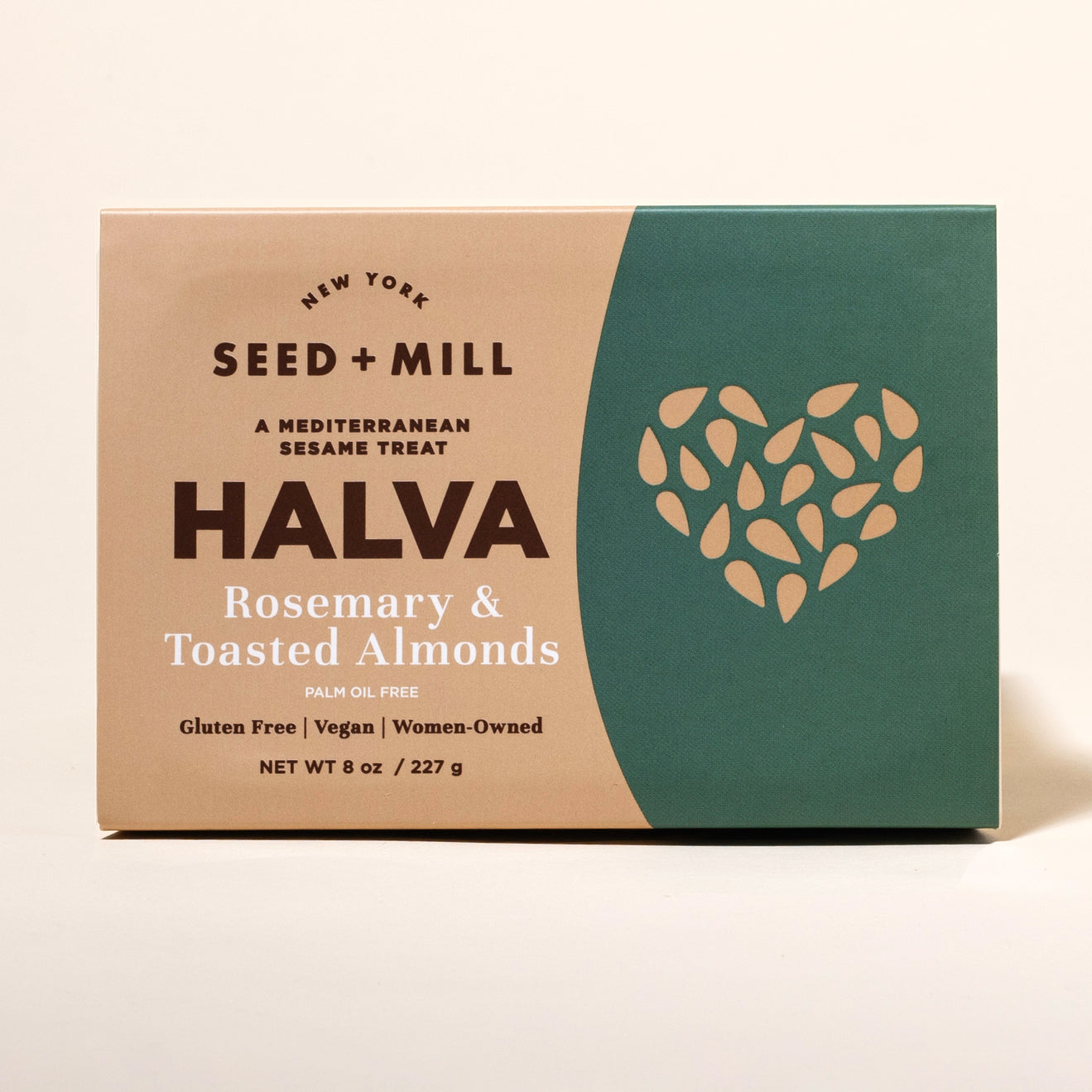 Box of Seed + Mill Halva with rosemary and toasted almonds flavor on a beige background