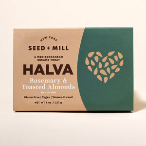 Box of Seed + Mill Halva with rosemary and toasted almonds flavor on a beige background