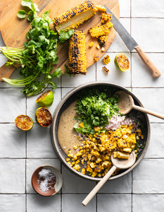 Picture of Tahini Elote with corn, cilantro, limes, and tahini 