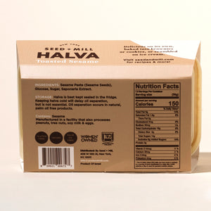 Back of a box of Seed + Mill Halva Toasted Sesame on a white background, nutritional information and ingredients are shown
